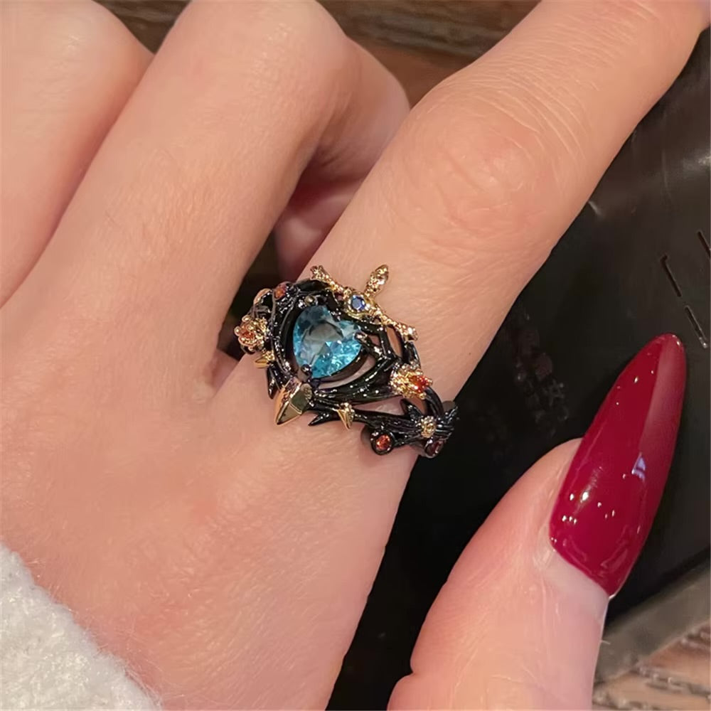 ANILLO PERLA AZUL CON ESPADA