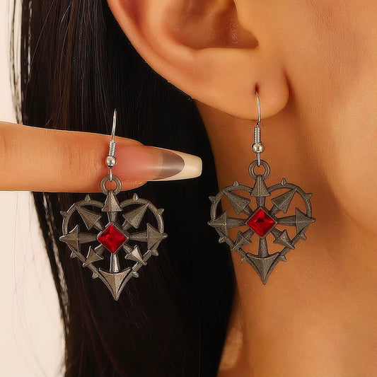 ARETES CORAZON ENCARCELADO