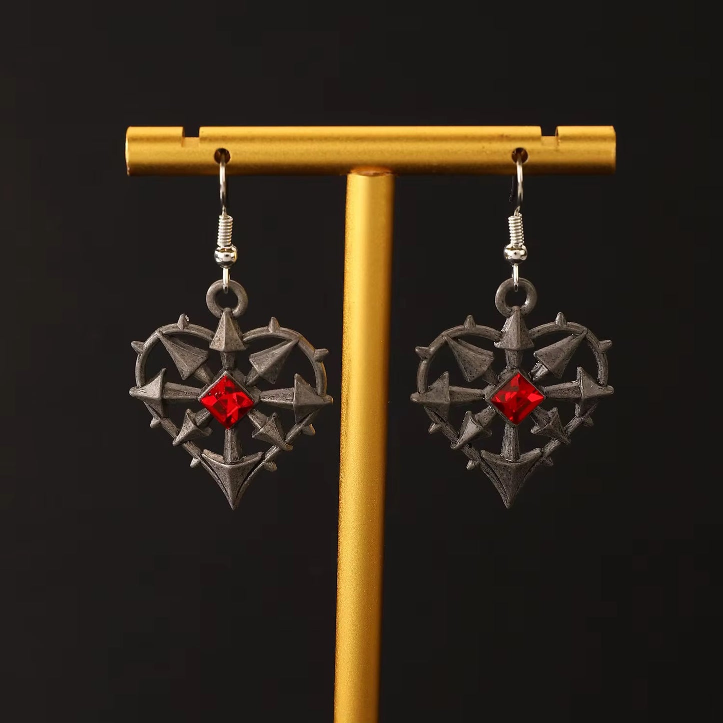 ARETES CORAZON ENCARCELADO