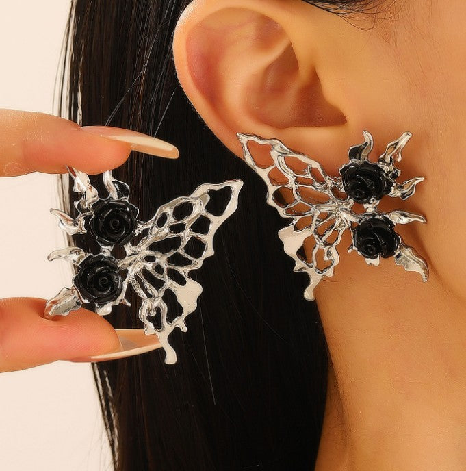 ARETES MARIPOSA ROSA