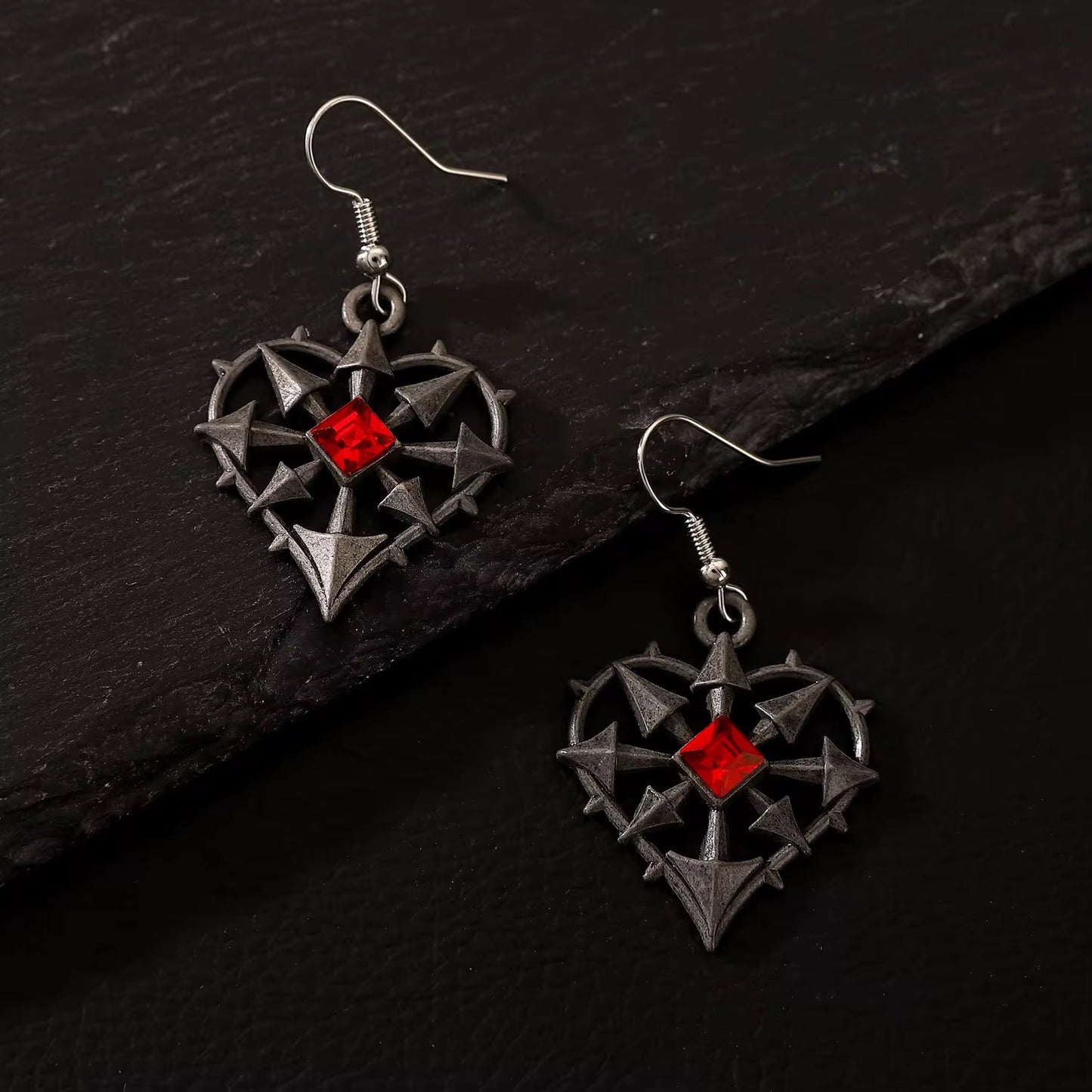 ARETES CORAZON ENCARCELADO