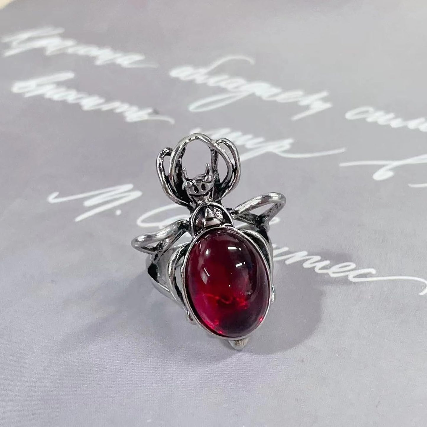 ANILLO ARAÑA PERLA ROJA